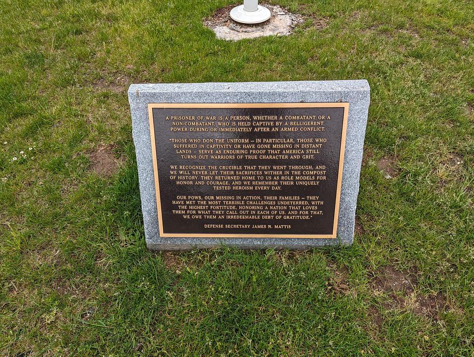 A stone with a plaque containing a quote from Defense Secretary James N. Mattis. 