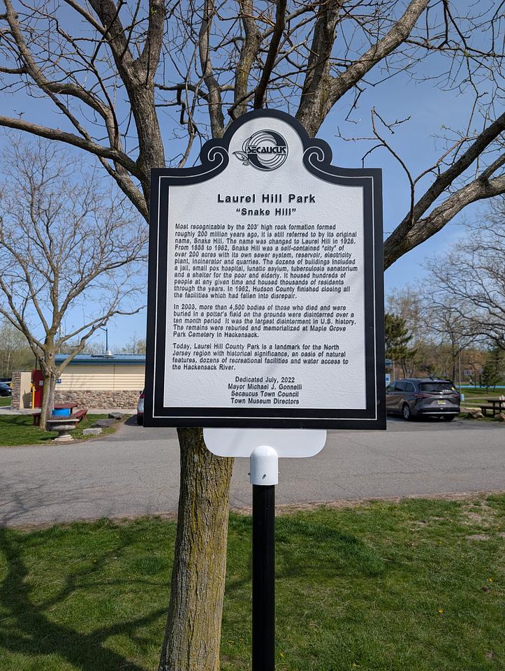 Sign providing information about this history of "Snake Hill", now known as Laurel Hill park.